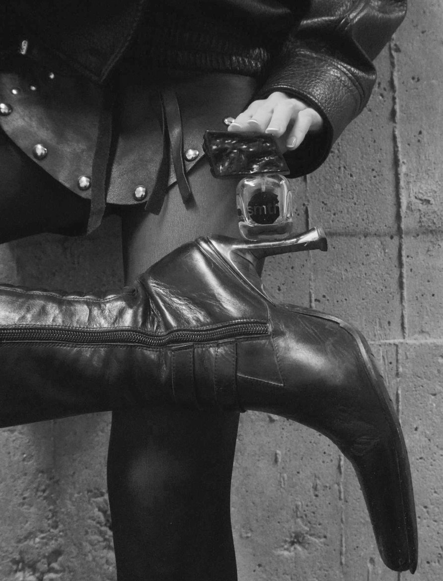 Stiletto boots with perfume bottle